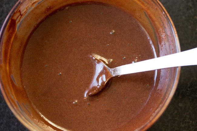 chocolate glaze in bowl to make chocolate donut