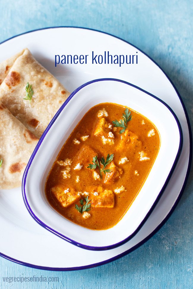 paneer kolhapuri served with roti on a white plate with text layover.