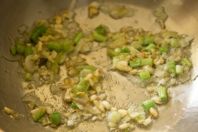 stir frying spring onion whites 