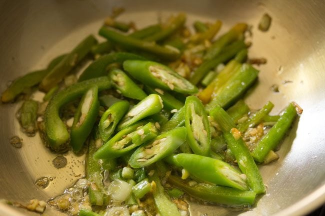 stir frying green chilies