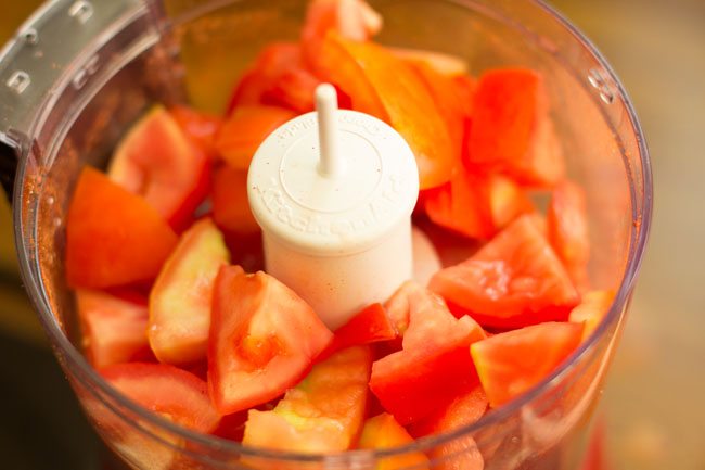 chopped tomatoes in a food processor