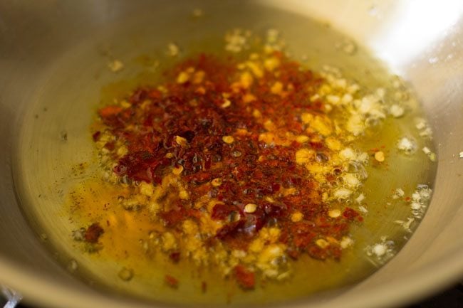 crushed red chili flakes in pan