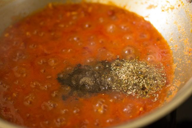 oregano and  black pepper added to pan