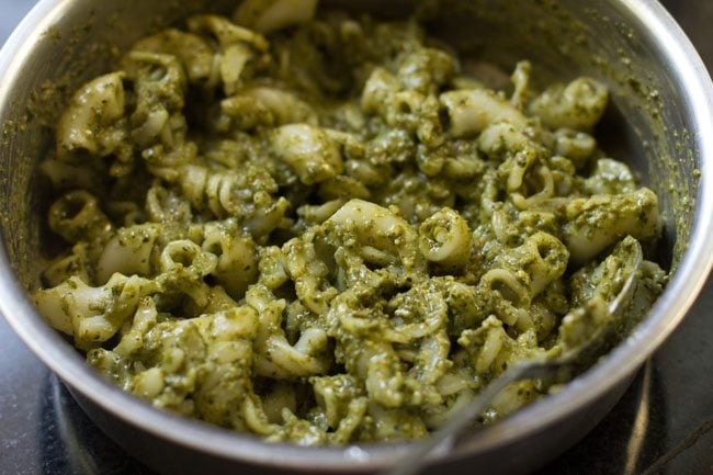 pasta mixed with the pesto sauce