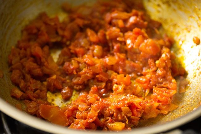 ground spices mixed with tomatoes