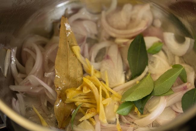 julienned ginger and curry leaves added to the onions. 
