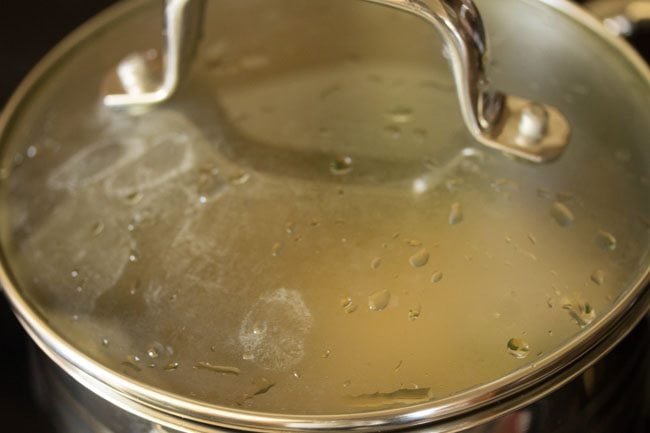 simmering potato stew in the covered pan. 