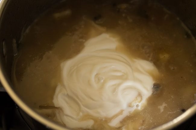 thick coconut milk added to the potato stew. 