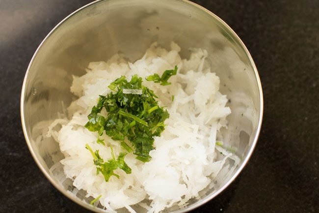 chopped coriander leaves added to the grated radish. 
