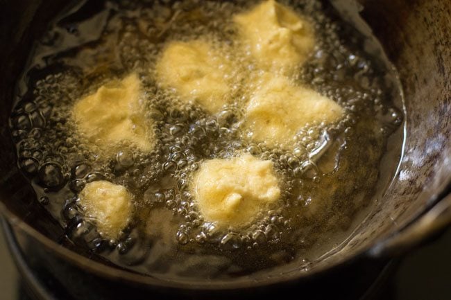 frying pakodas in hot oil. 