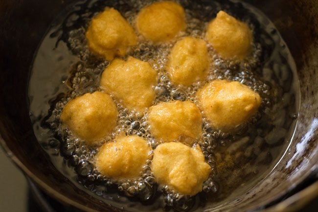 frying pakodas in hot oil. 