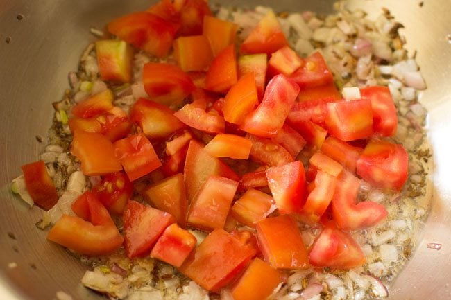 tomatoes for preparing veg kathi rolls recipe