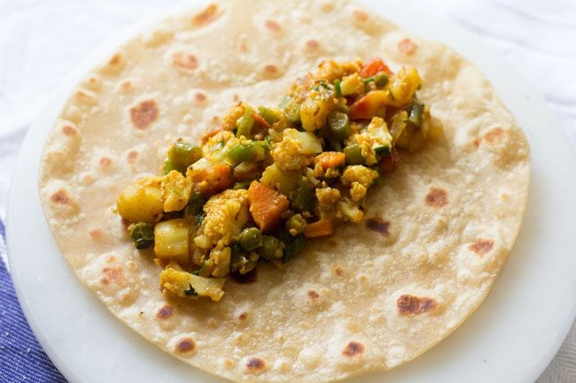 making veg kathi rolls recipe