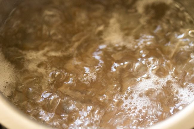 cooking pasta in boiling water. 