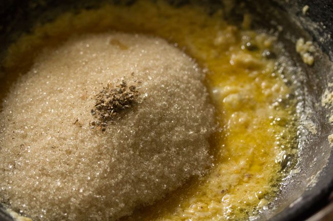 ghee mixture, cardamom powder and sugar
