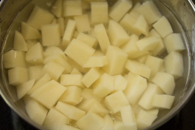 potatoes soaked in water in a bowl