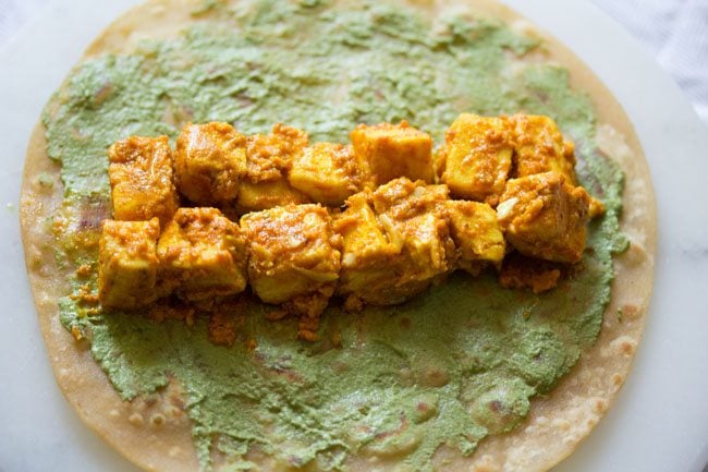 paneer tikka added to center third of the wrap.