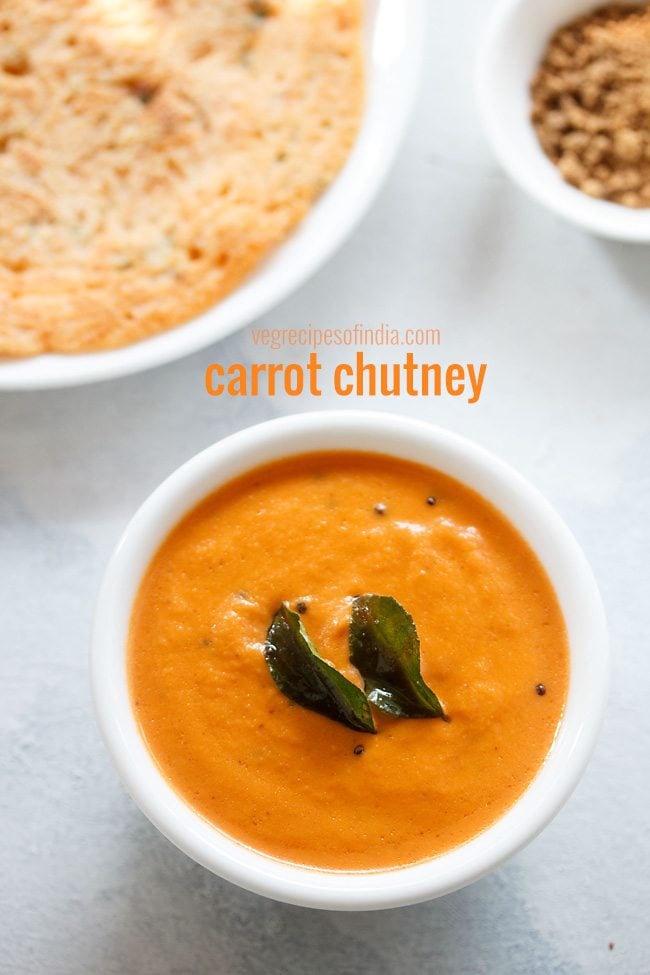 carrot chutney served in a bowl with dosa and text layover.