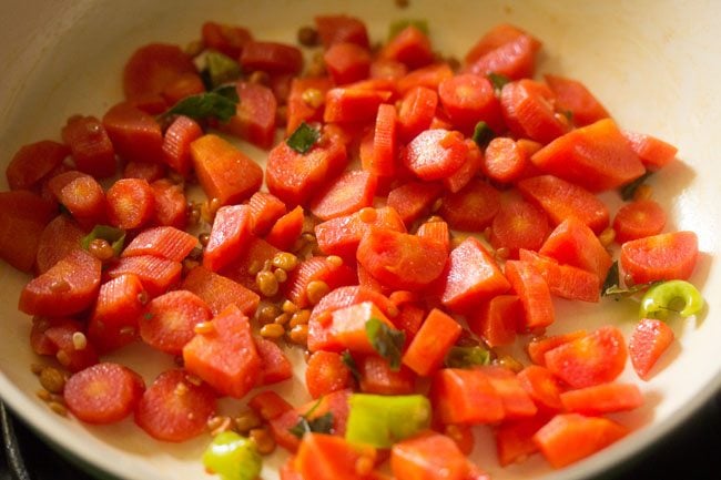 sauteing carrots in the pan