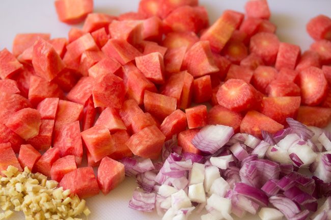 carrots, onions, and ginger after being chopped. 