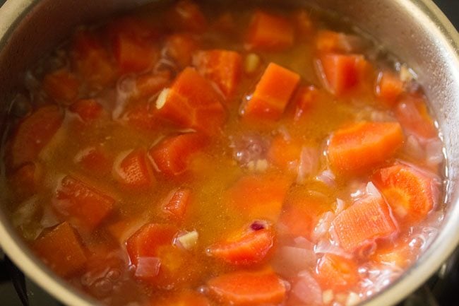 carrots are fork tender, so it is time to purée the soup. 