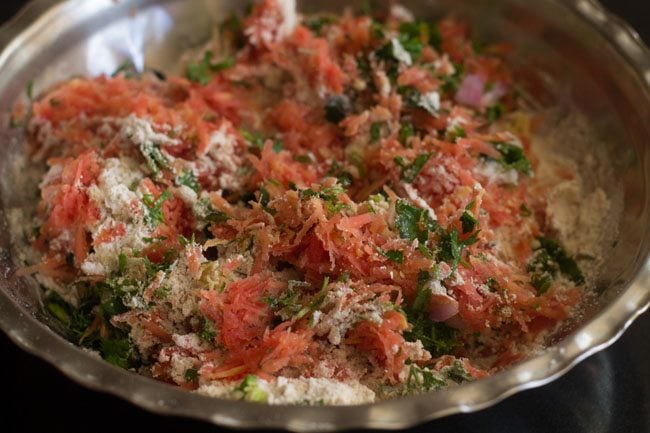 mixing carrot paratha dough mixture