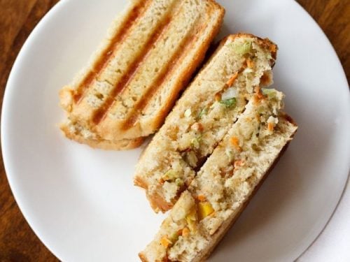 curd sandwich pieces served on a white plate.