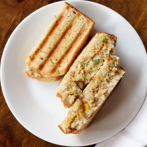 curd sandwich pieces served on a white plate.