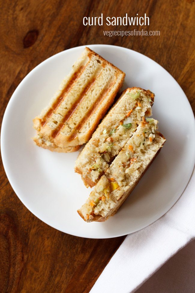 curd sandwich pieces served on a white plate with text layovers.