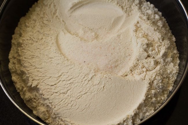 whole wheat flour and salt in a mixing bowl.