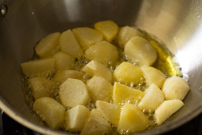 frying potatoes in hot ghee. 