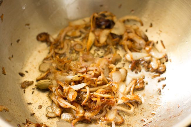 remove 50 percent of fried onions from the pan. 