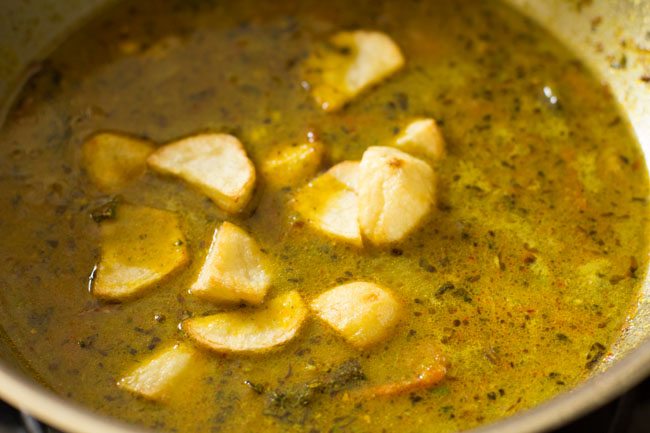 preparing Hyderabadi style dum aloo biryani recipe