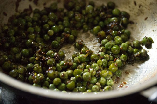 preparing matar poha recipe