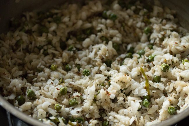 preparing matar poha recipe