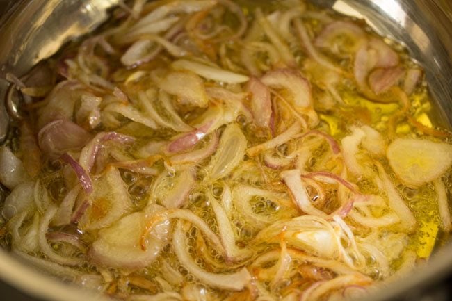 sautéing onions in ghee. 