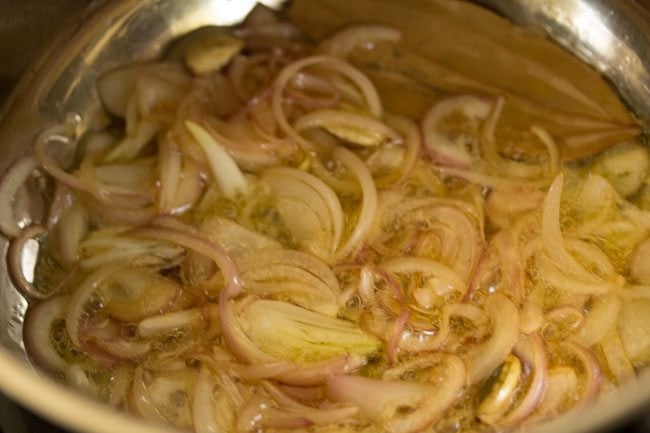 sautéing onions in ghee. 