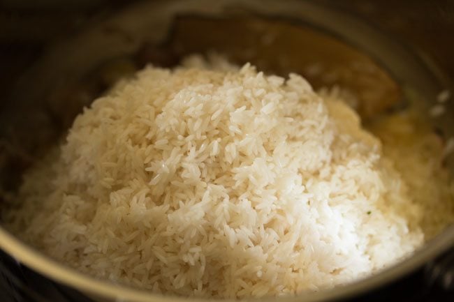 rice added to the onions to make nei choru.