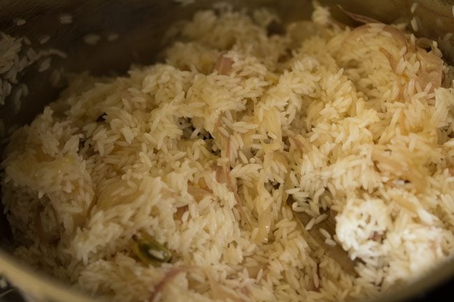 rice mixed with the rest of the ingredients in pan. 