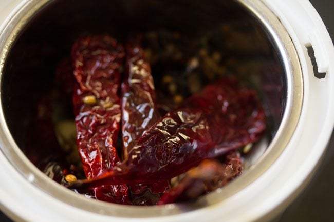 roasted spice mixture in a small grinder jar