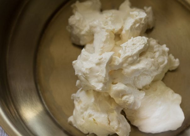 hung curd in a bowl.