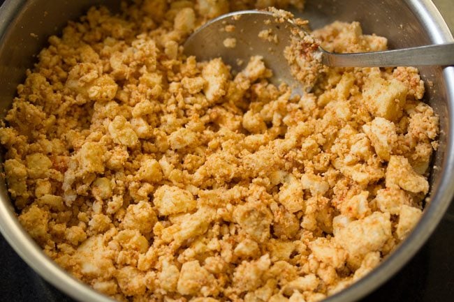 spice powders, curd and salt mixed well with the crumbled paneer. 