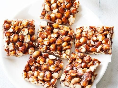 ppeanut chikki squares on a white plate