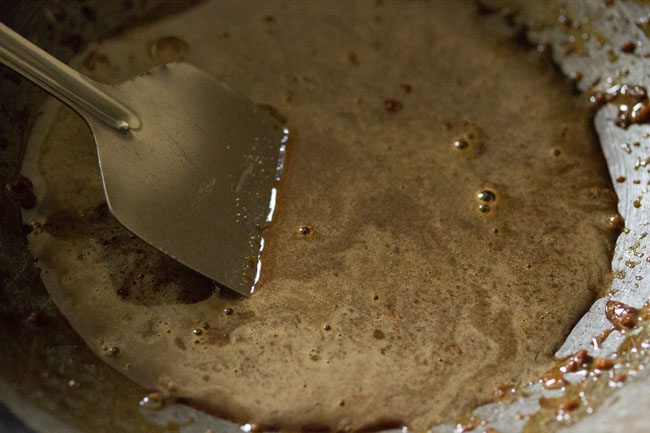 jaggery syrup on a hot pan