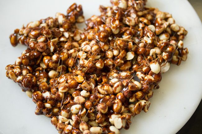 chikki mixture on a white plate