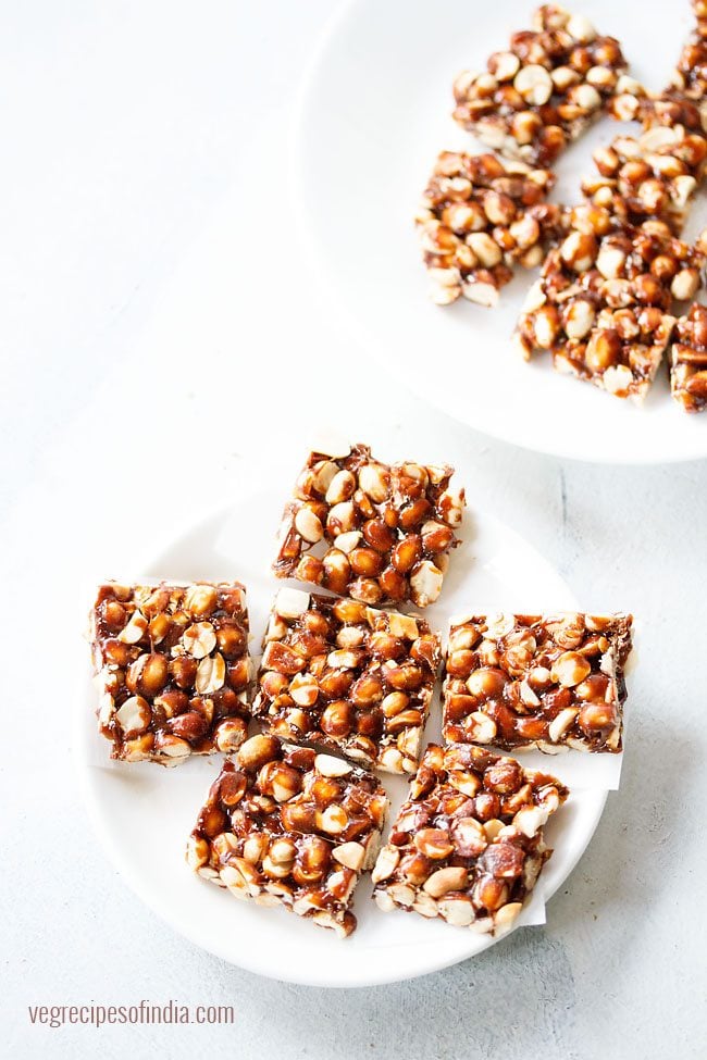 chikki squares on a white plate