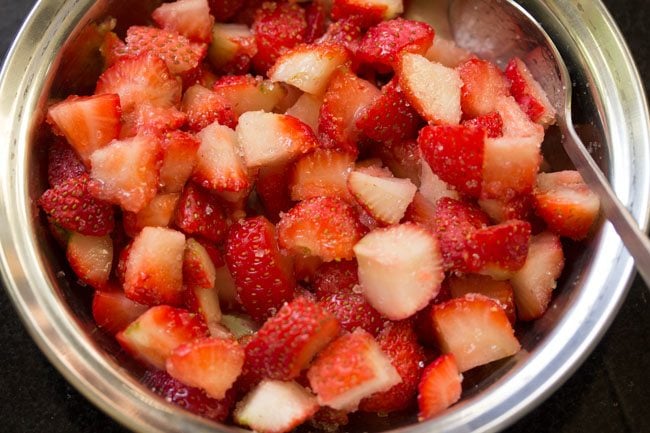 sugar mixed with chopped strawberries. 