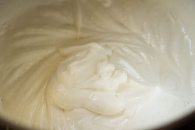 whipping cream-sugar mixture till soft peaks are formed. 