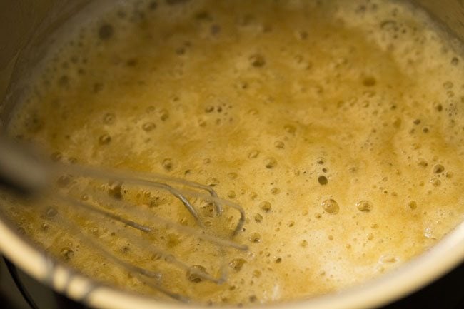 whisking flour into the butter for white sauce recipe. 