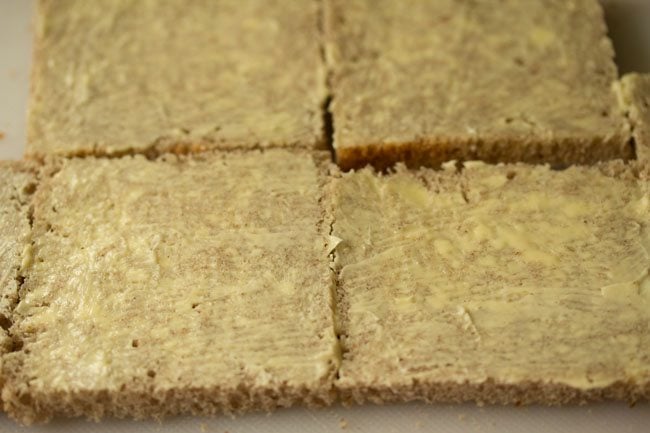 butter layer spread on bread slices